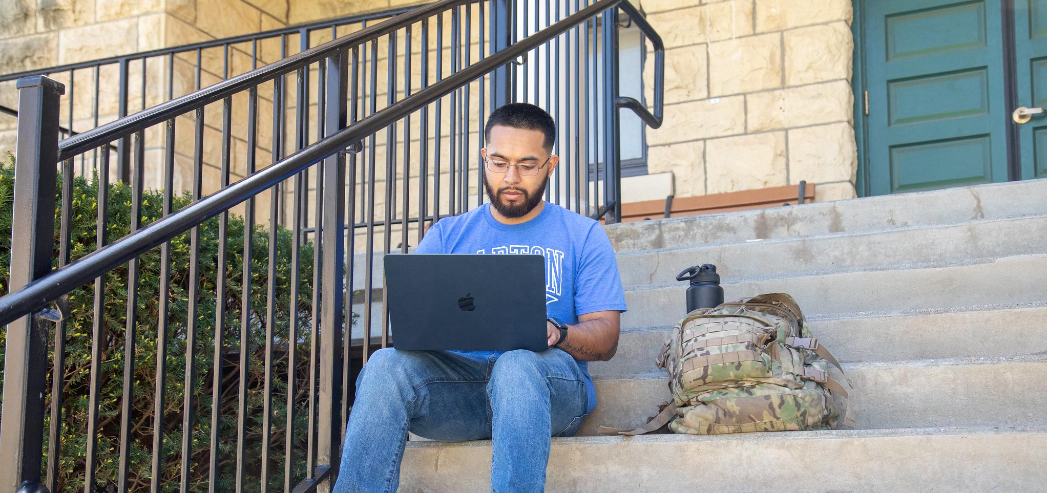 A Barton student sits on 
