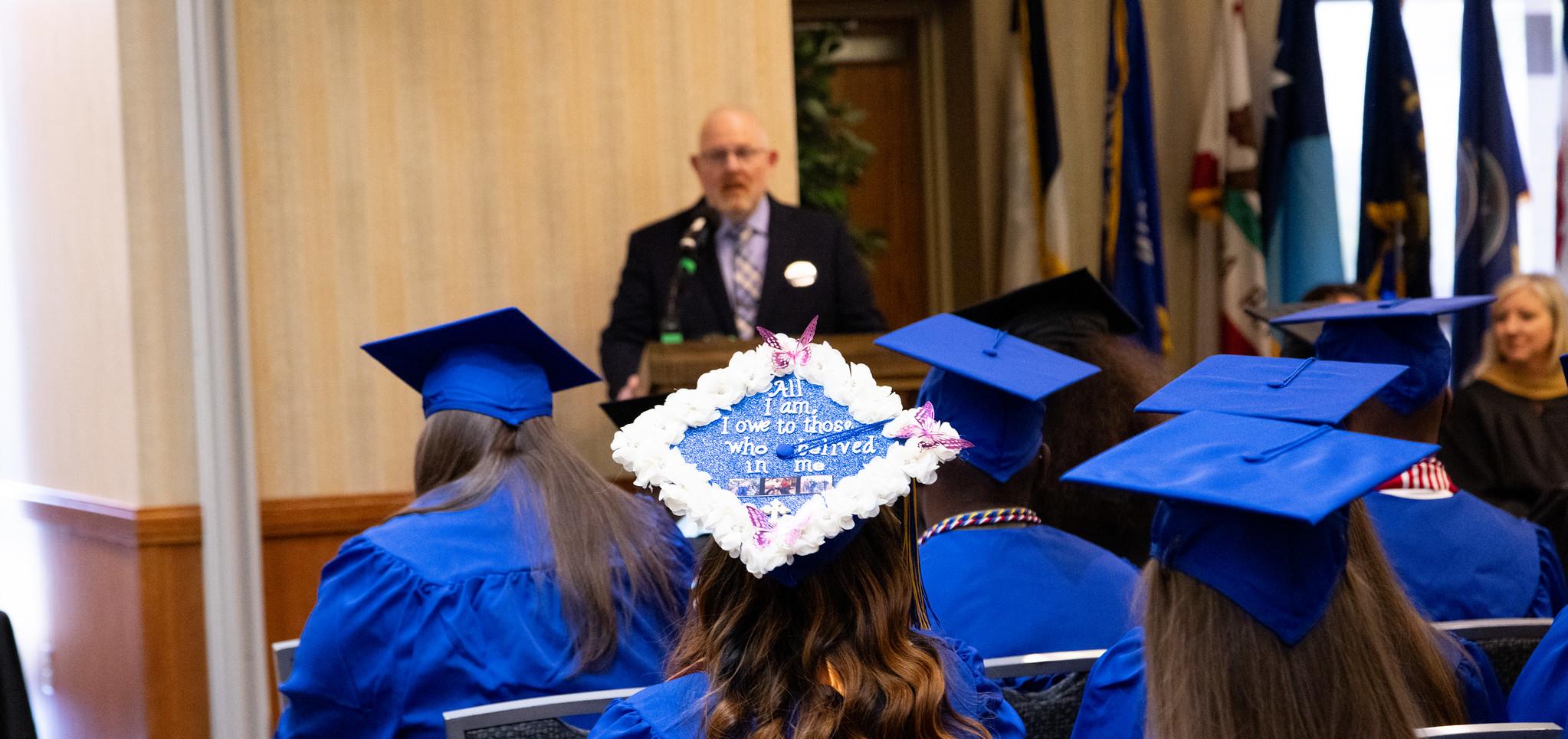 Graduate's decorated cap during Fort Riley Commencement