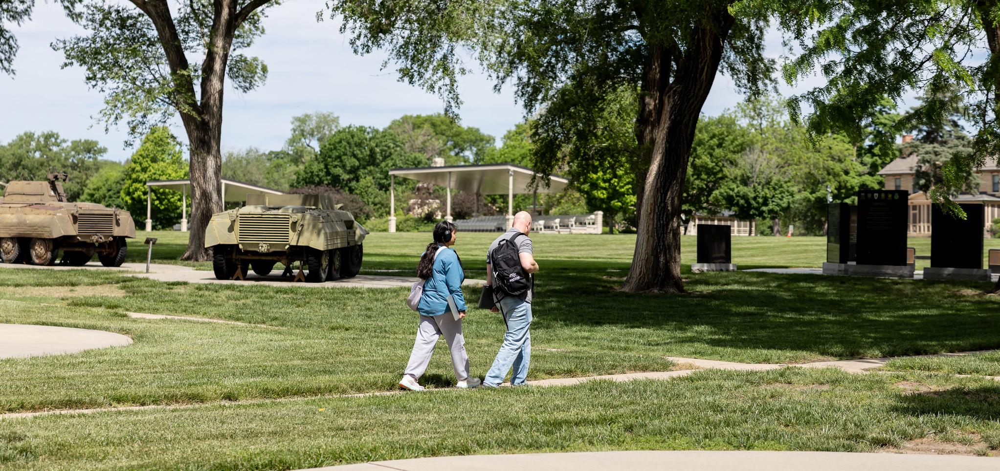 Two students walk across Fort Riley Campus